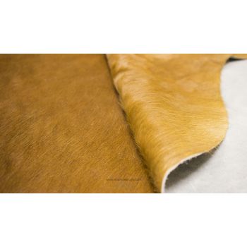 Iridescent Brown and White Cowhide Rug